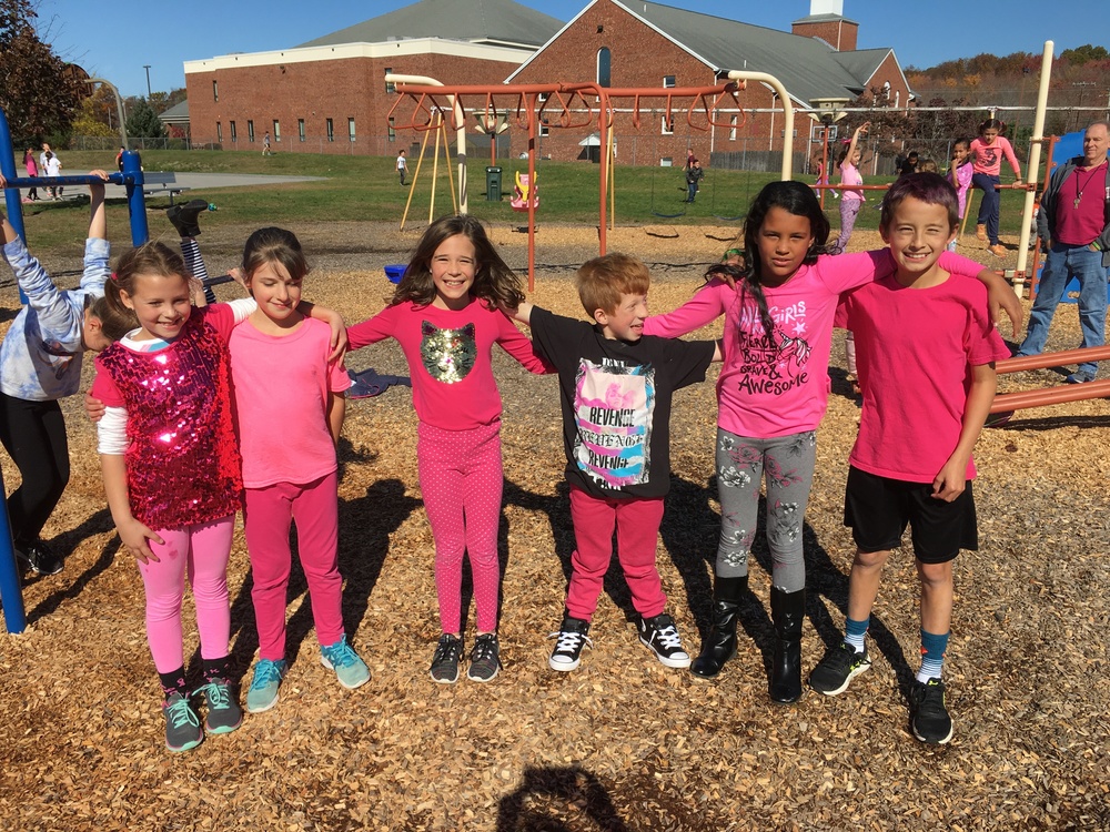 Students on the playground on Pink Out day