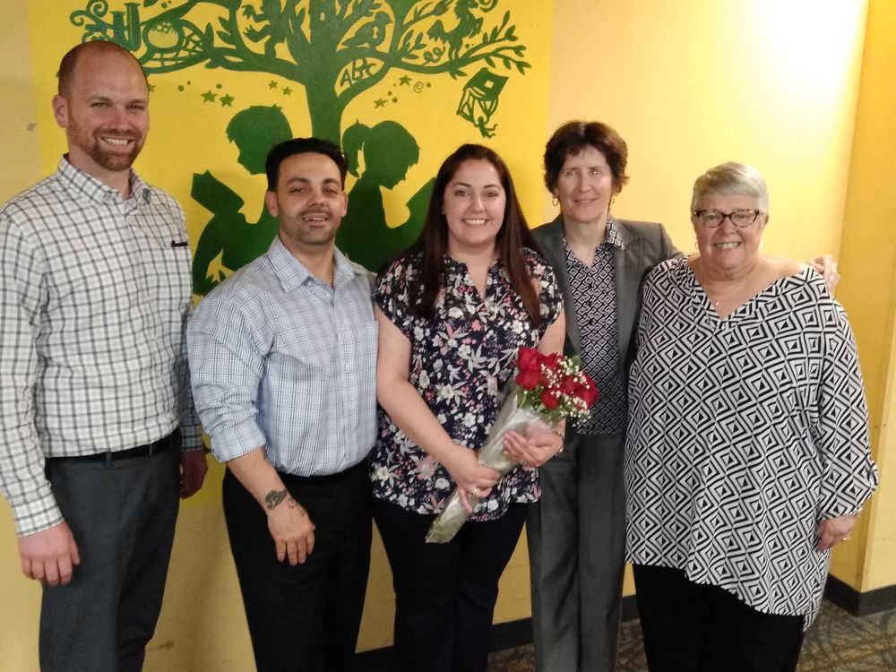 Victoria Carruba, family, and school administrators